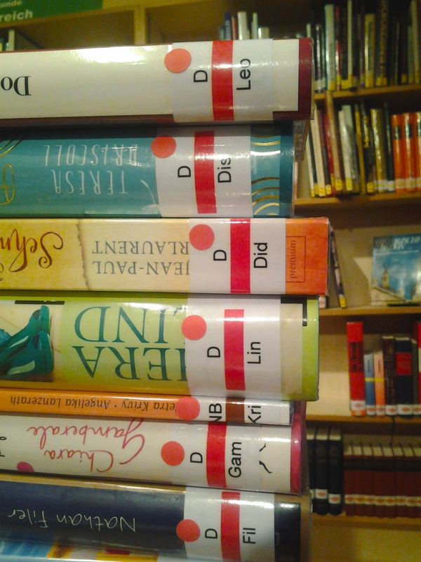 Neu Bücher sind mit einem roten Punkt gekennzeichnet.